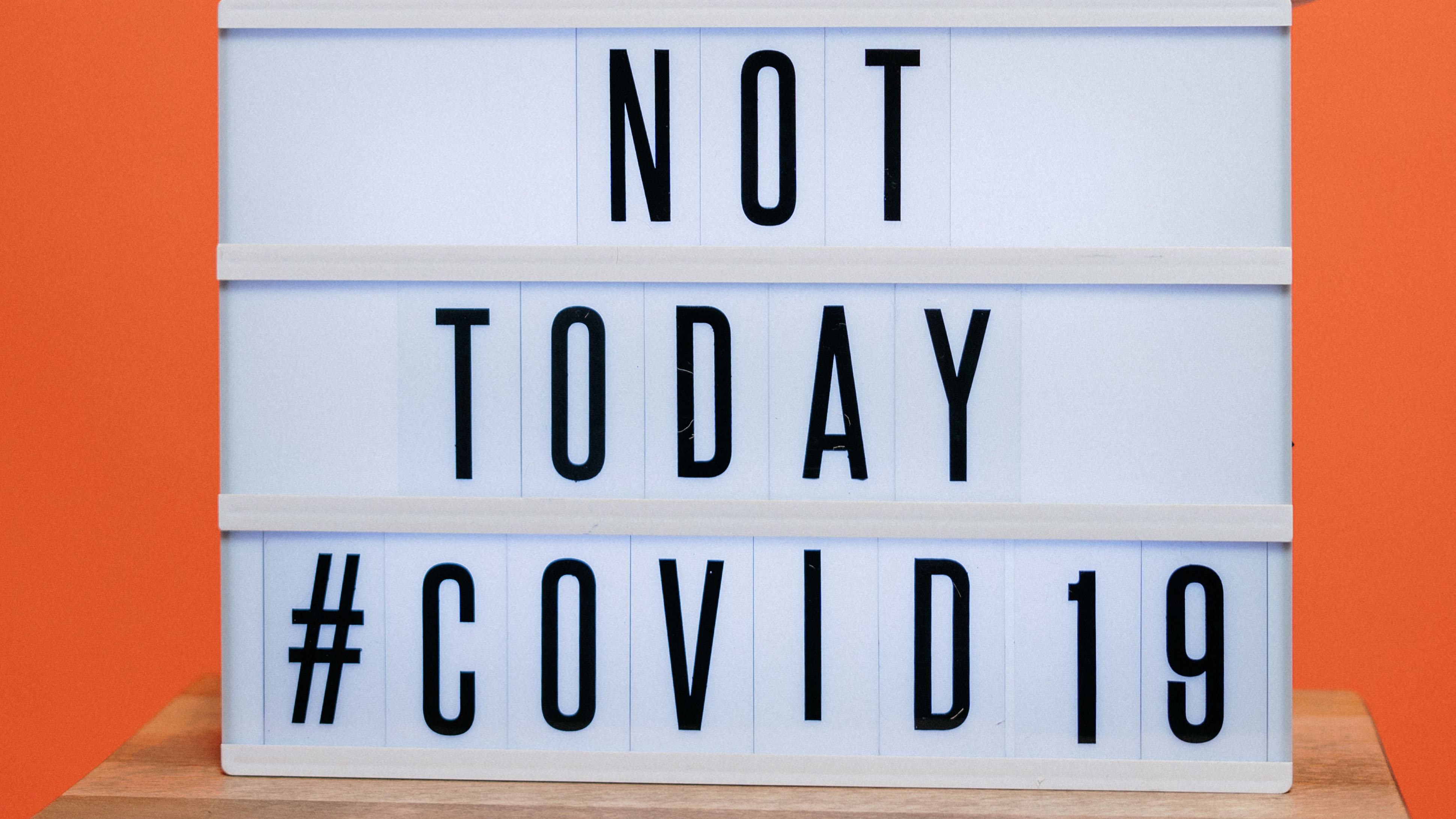 Sign reads "Not today #COVID19"